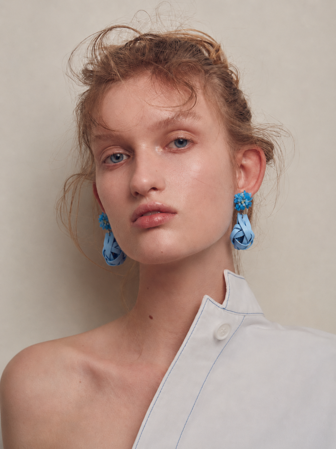Model wearing Remnant Lab handmade jewelry